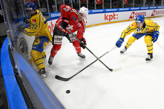 Tim Heed and Dennis Rasmussen of Sweden and Marco Miranda