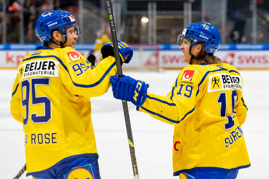 Jacob de la Rosa and Marcus Soerensen of Sweden celebrate