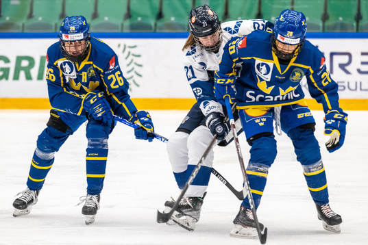 Hanna Olsson and Fanny Rask of Sweden and Jenna Kaila of