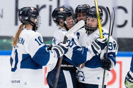 Julia Liikala of Finland celebrates with teammates
