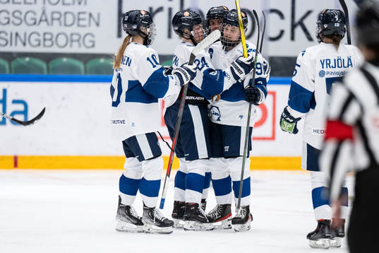 Julia Liikala of Finland celebrates with teammates