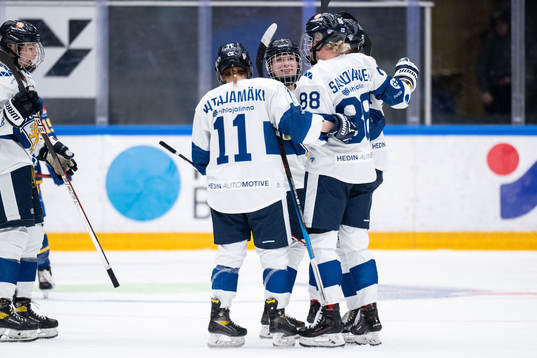 Ronja Savolainen of Finland celebrates with. Teammates