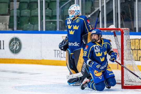 Goaltender Tindra Holm and Solveig Gisler  of Sweden