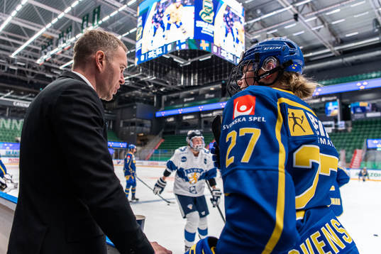 Goaltender coach Ola Kahem and Elin Svensson of Sweden