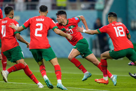 Achraf Dari of Morocco celebrates