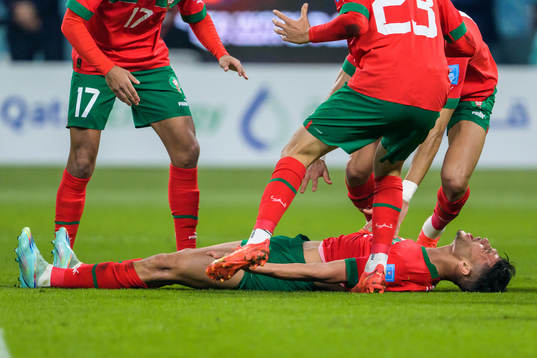 Achraf Dari of Morocco celebrate with teammates