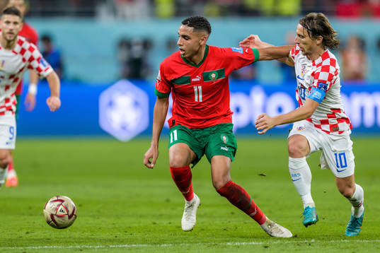Abdelhamid Sabiri of Morocco and Luka Modric of Croatia
