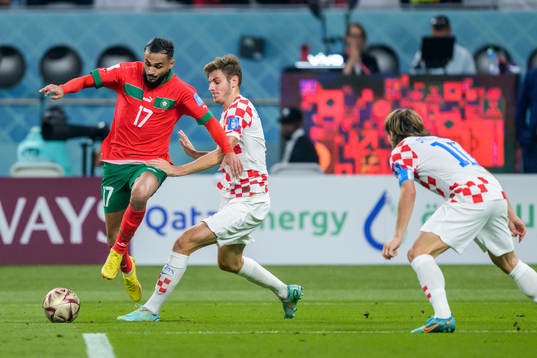 Sofiane Boufal of Morocco and Josip Stanisic of Croatia
