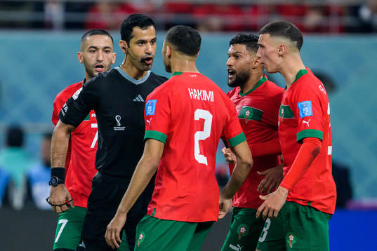 Referee Abdulrahman Al Jassim in a discussion with Achraf