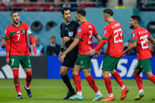 Referee Abdulrahman Al Jassim in a discussion with Achraf