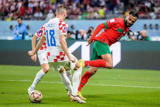 Ivan Perisic and Mislav Orsic of Croatia against Sofiane