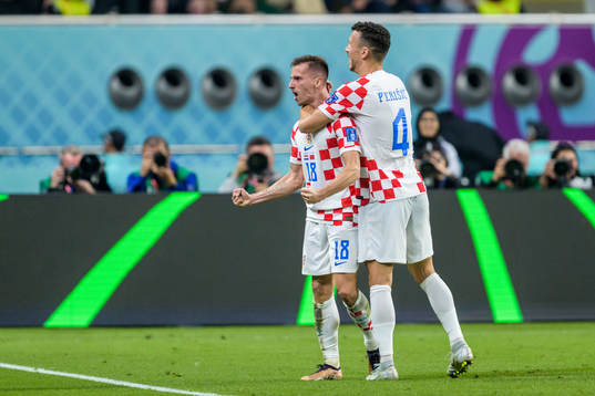 Mislav Orsic and Ivan Perisic of Croatia celebrate