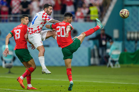 Jawad El Yamiq and Achraf Dari of Morocco against Marko