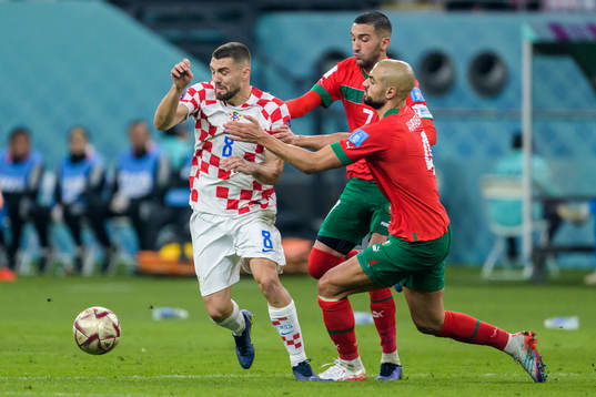 Mateo Kovacic of Croatia against Hakim Ziyech and Sofyan