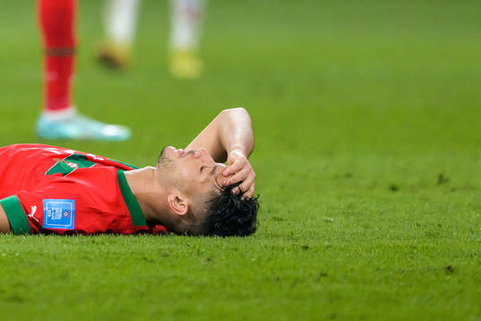 Achraf Dari of Morocco in pain