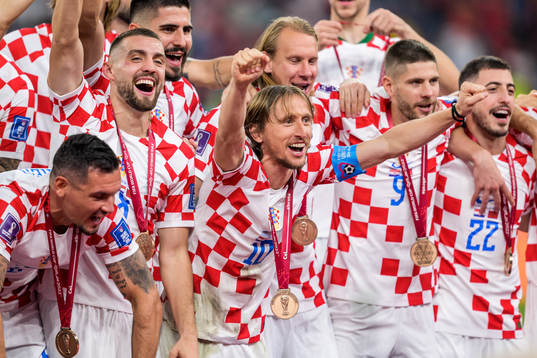 Luka Modric of Croatia celebrate with teammates