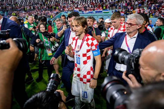 Luka Modric of Croatia celebrates with his medal