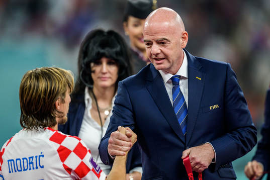 Luka Modric of Croatia and Gianni Infantino, president of