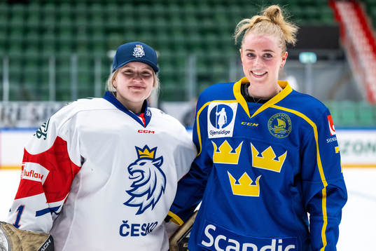 Goaltender Viktorie Svejdova of Czech Republic and Emma