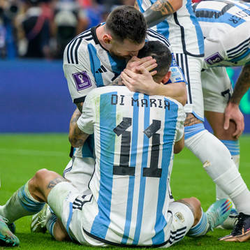 Angel de Maria and Lionel Messi of Argentina celebrate