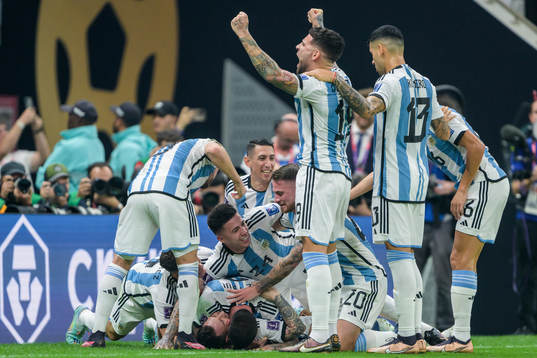 Lionel Messi of Argentina celebrate with teammates