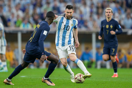 Ousmane Dembele of France and Lionel Messi of Argentina