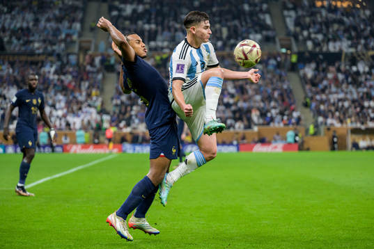 Jules Kounde of France and Julian Alvarez of Argentina