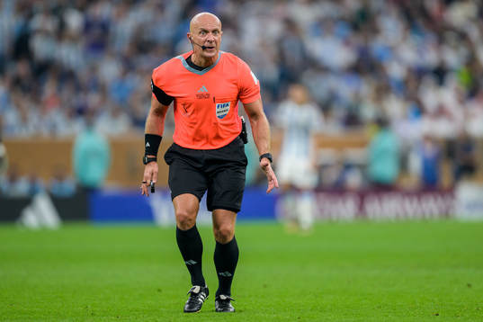 referee Szymon Marciniak