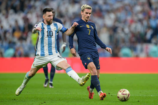 Lionel Messi of Argentina and Antoine Griezmann of France
