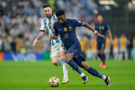 Lionel Messi of Argentina and Aurelien Tchouameni of France