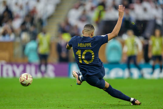 Kylian Mbappe of France scores 2-2