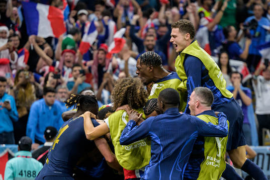 Players of France celebrate