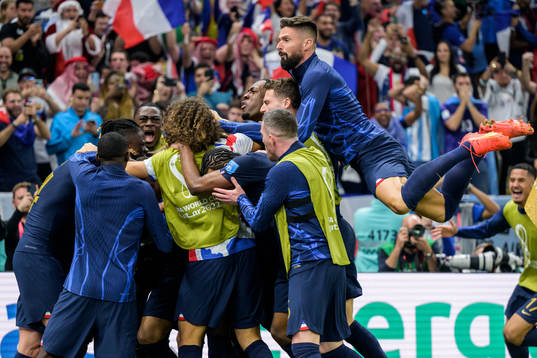 Players of France celebrate