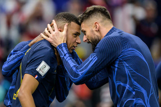 Kylian Mbappe and Olivier Giroud of France celebrate