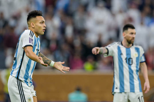 Lautaro Martinez and Lionel Messi of Argentina