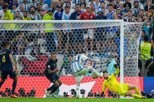 Lionel Messi of Argentina scores 3-2