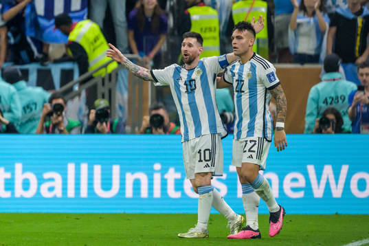 Lionel Messi and Lautaro Martinez of Argentina celebrate