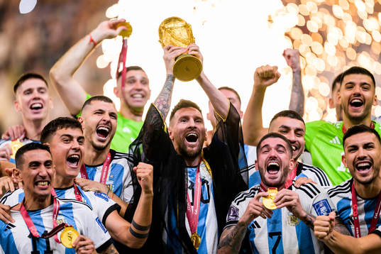 Lionel Messi of Argentina lifts the FIFA World Cup Trophy
