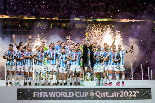 Lionel Messi of Argentina lifts the FIFA World Cup Trophy