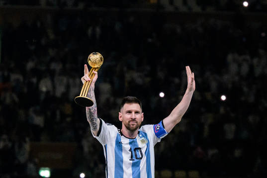 Lionel Messi of Argentina with his Golden Ball Award