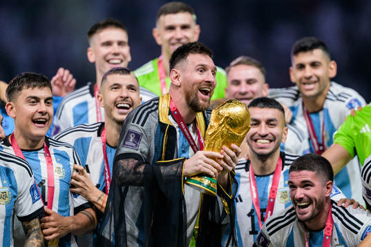 Lionel Messi of Argentina celebrates with the FIFA World