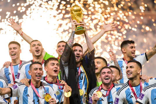 Lionel Messi and players of Argentina celebrate with the