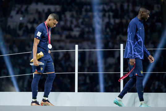 Kylian Mbappe of France looks dejected