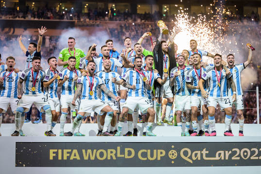 Lionel Messi and players of Argentina celebrate with the