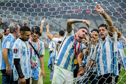 Rodrigo de Paul of Argentina cut the net of the goal