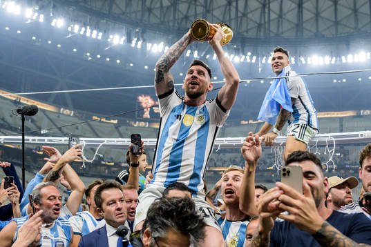 Lionel Messi of Argentina celebrates with the FIFA World