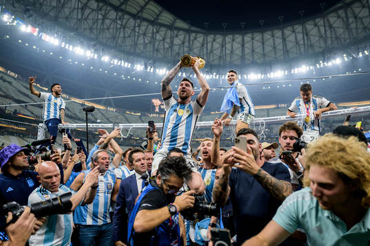 Lionel Messi of Argentina celebrates with the FIFA World