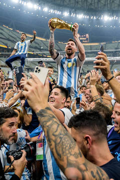 Lionel Messi of Argentina celebrates with the FIFA World