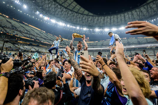 Lionel Messi of Argentina celebrates with the FIFA World