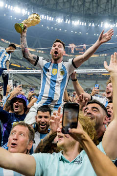 Lionel Messi of Argentina celebrates with the FIFA World